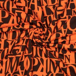 Viskosejersey med bogstaver i orange