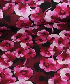 Viskosejersey med pinke blomster