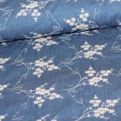 Denim med broderi i mellem blå