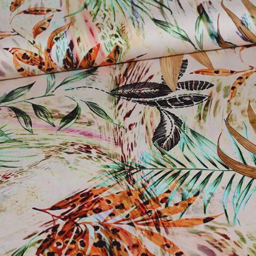 Vævet viskose med stretch i sart rosa med blad print