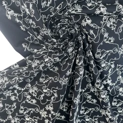 Gabardine i sort med broderi