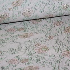 Brokade med grøn print og guld