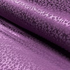 Satinvævet jacquard polyester i magenta