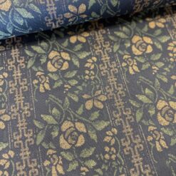 Twillvævet viskose/polyester med glimmerdetaljer