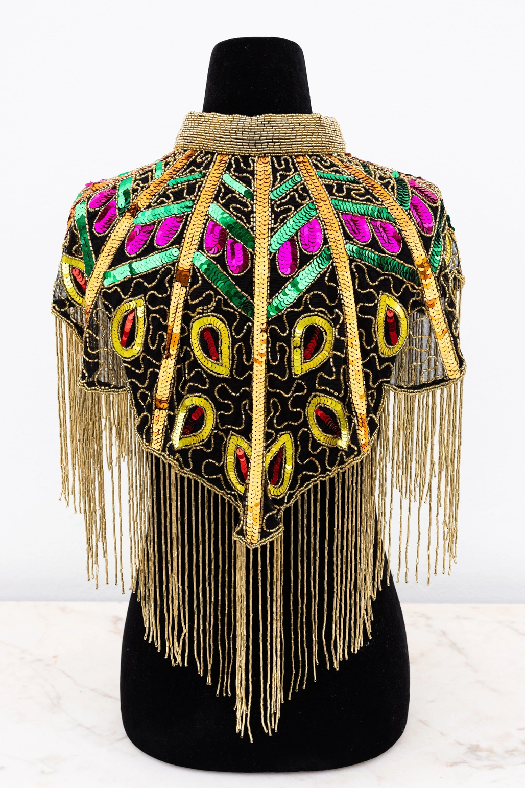 Paillet disko-kappe med tropicsmønster