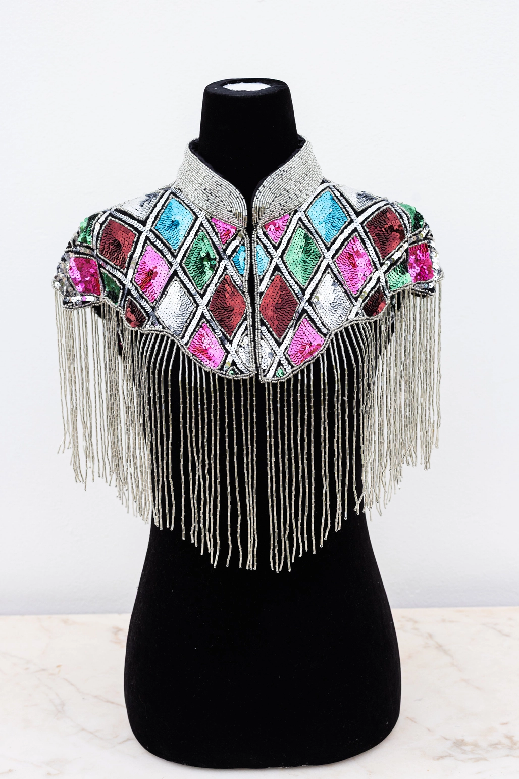 Paillet disko-kappe med harlekinmønster