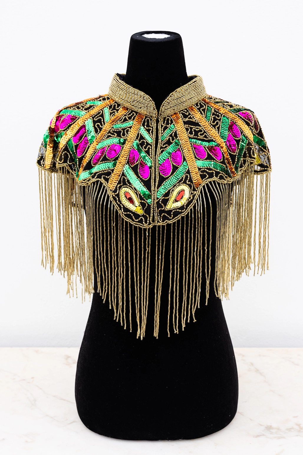 Paillet disko-kappe med tropicsmønster