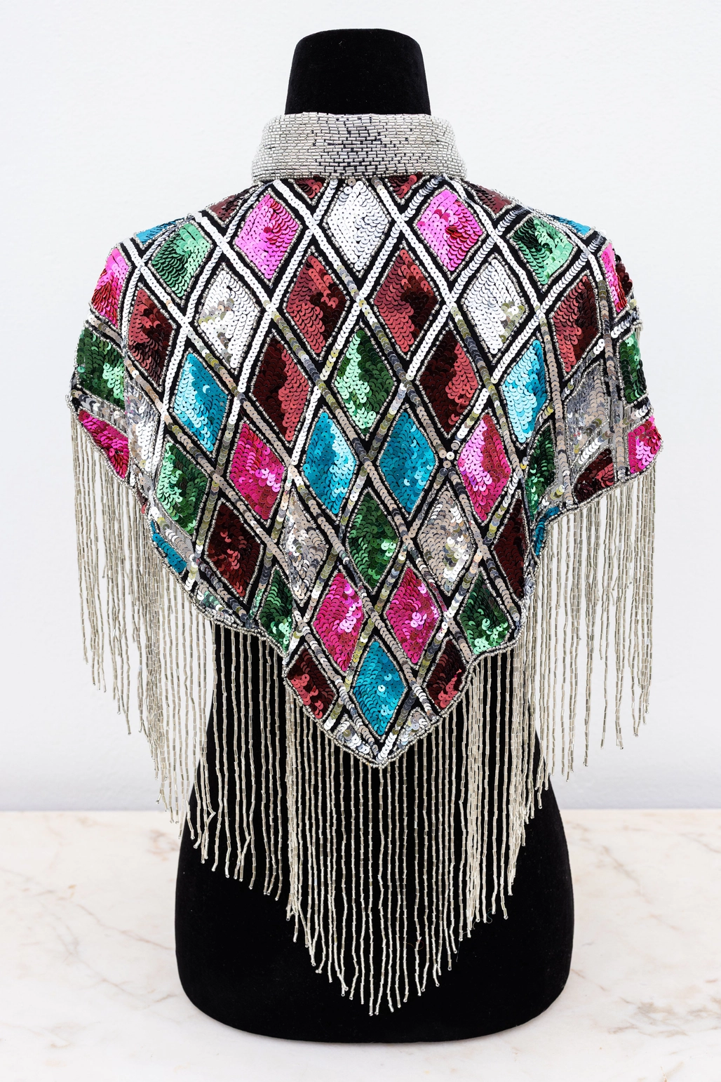 Paillet disko-kappe med harlekinmønster