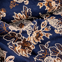 Chambray med broderi