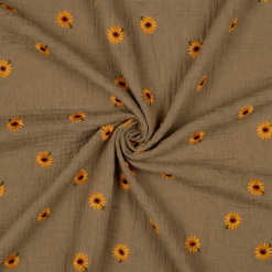 Beige double gauze med broderede solsikker