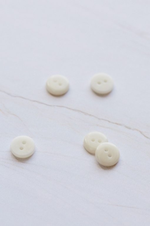 2-hole corozo button fv. creme white - 11 mm