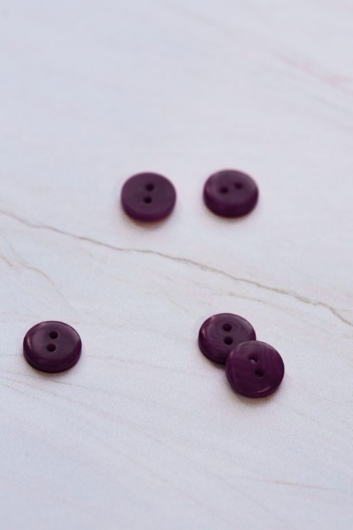 2-hole corozo button fv. plum - 11 mm
