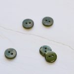 2-hole corozo button fv. green olive - 11 mm