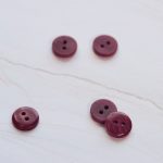 2-hole corozo button fv. fuchsia - 11 mm