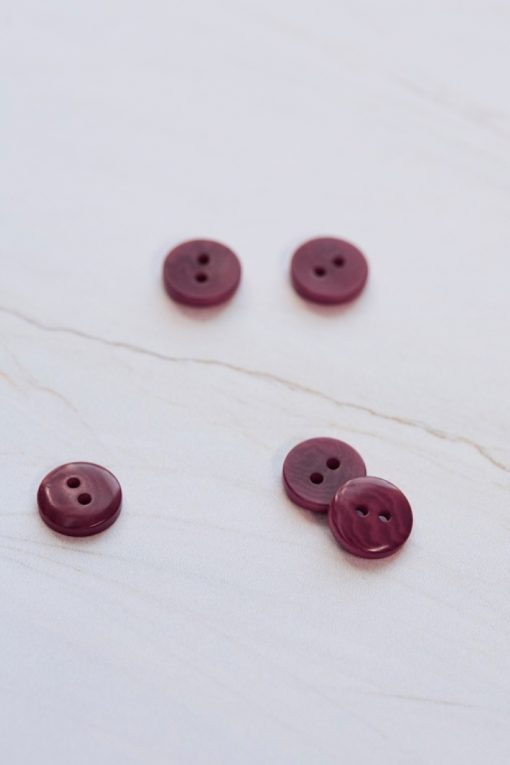 2-hole corozo button fv. fuchsia - 11 mm