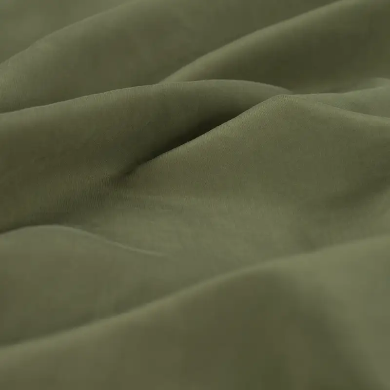 Sandvasket viskose i khaki "cupro touch"